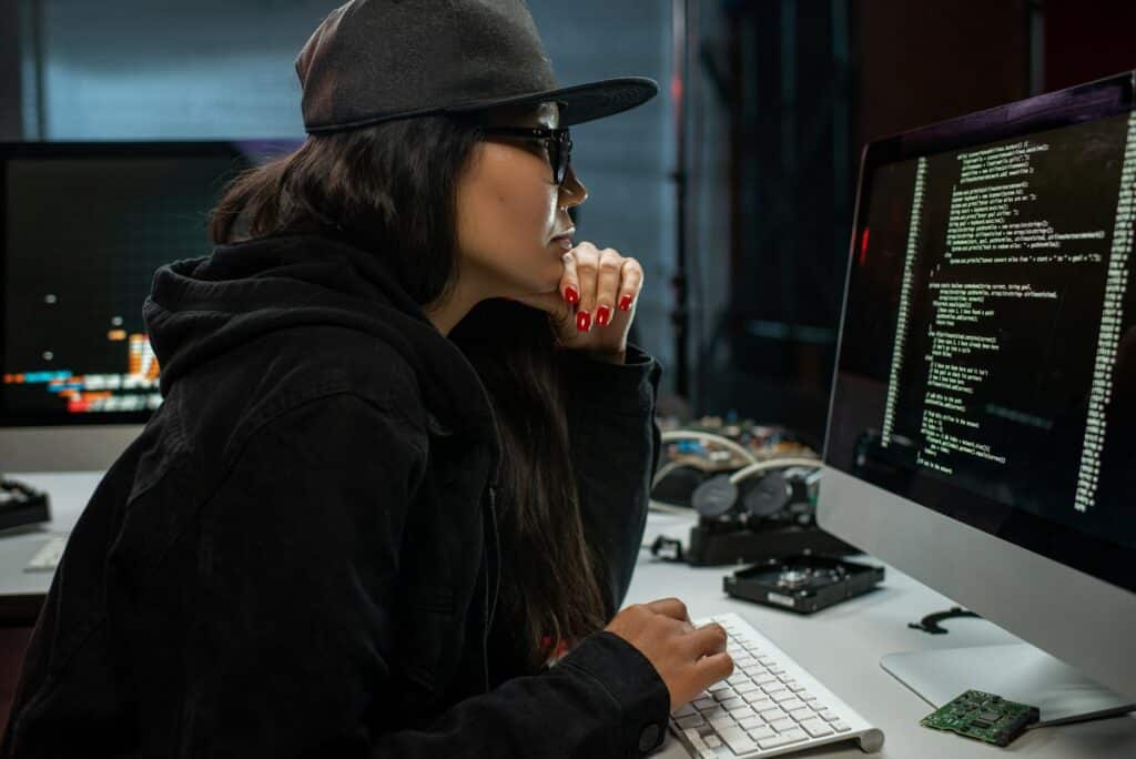 Female hacker entering website illegaly